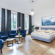 Luxurious Modern Bedroom with Sitting Area and King Bed